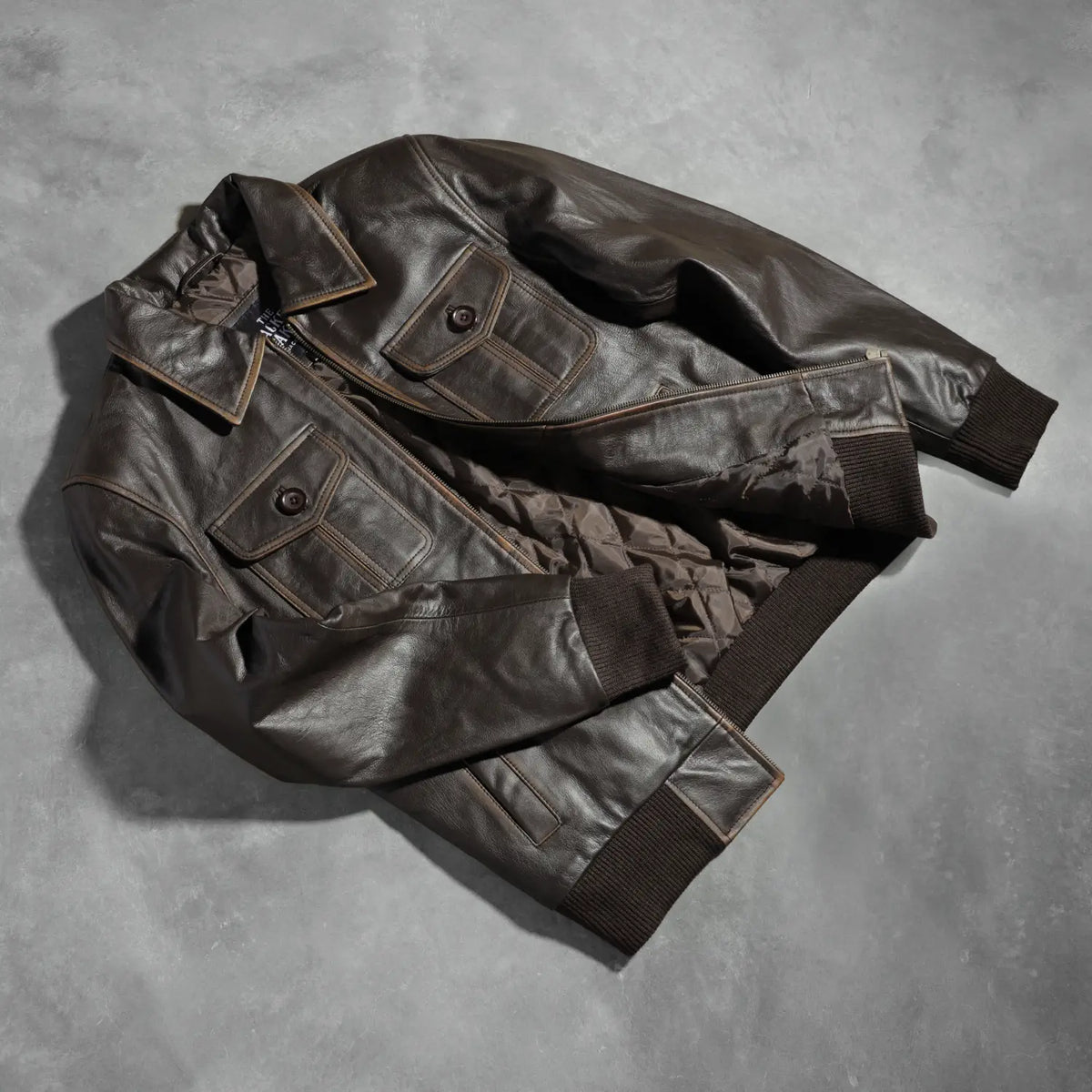Knit Rib &amp; Hem Craftsmanship Construction Detail on Men's Aaron Distressed Brown Leather Bomber Jacket