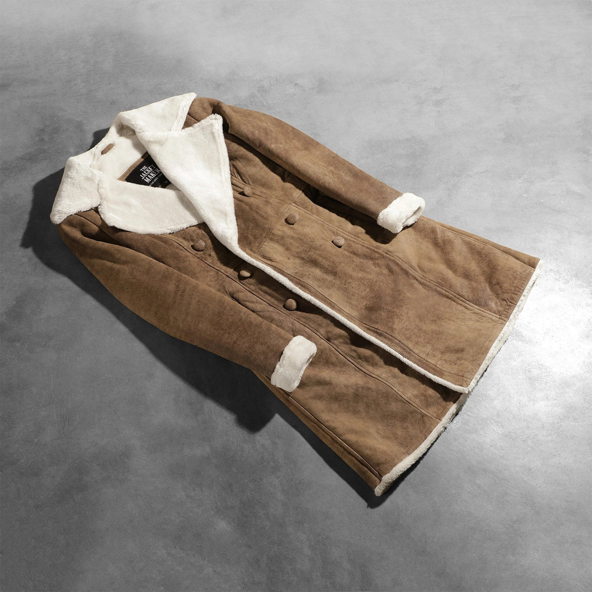 Open Hem &amp; Hem Craftsmanship Construction Detail on Amie Distressed Brown Double Breasted Shearling Coat