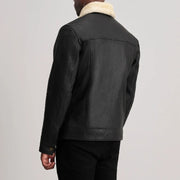
细节特写 of Classic Collar & Button Hardware on Dallis Tumbled Black Shearling Trucker Jacket