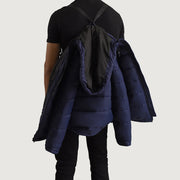 Close-Up Detail of Classic Collar &amp; Zipper With Wind Flap Hardware on Erico Blue Hooded Puffer 真皮夹克 男士