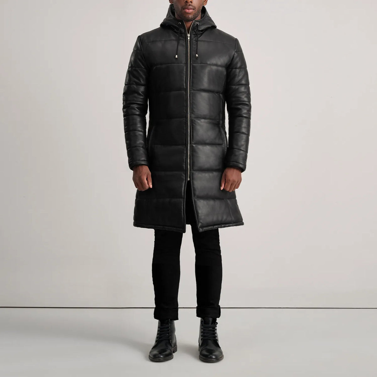 
Floyd Tan Hooded Leather Puffer Coat - 展现立体袖型与合身版型的侧身视角