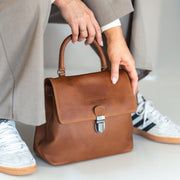 Styled Fit Perspective of Angera Full-Grain Leather Handbag 女士 on Model - Natural Daylight Drape