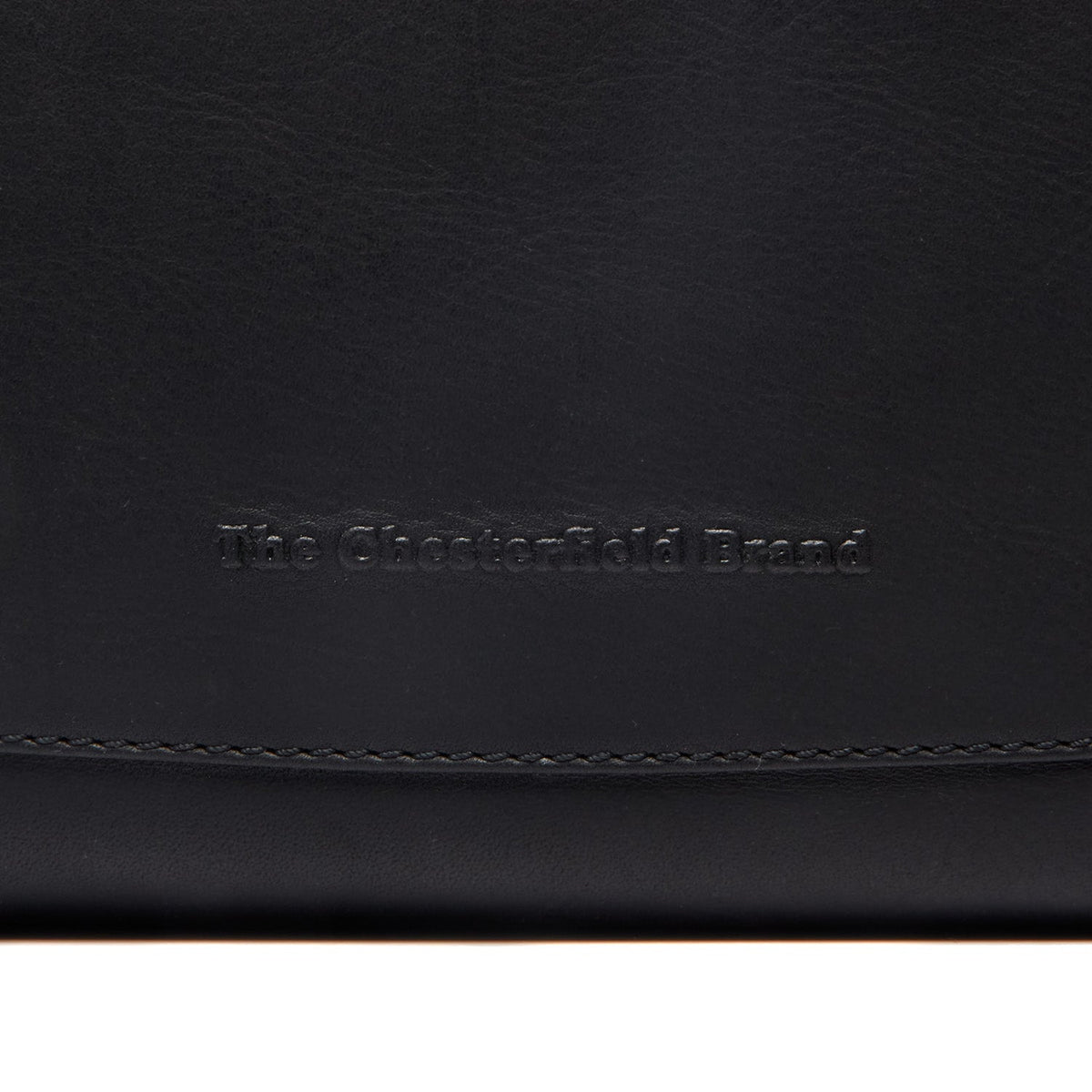 
Classic 100% Full-Grain leather Bag - 展现加固真皮背带与承重走线的背部视角