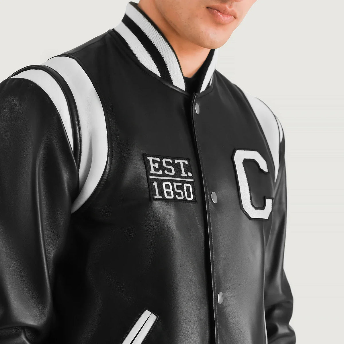 
细节特写 of Varsity & Snap Button Hardware on Liberte California 经典黑 Leather Varsity 真皮夹克 男士