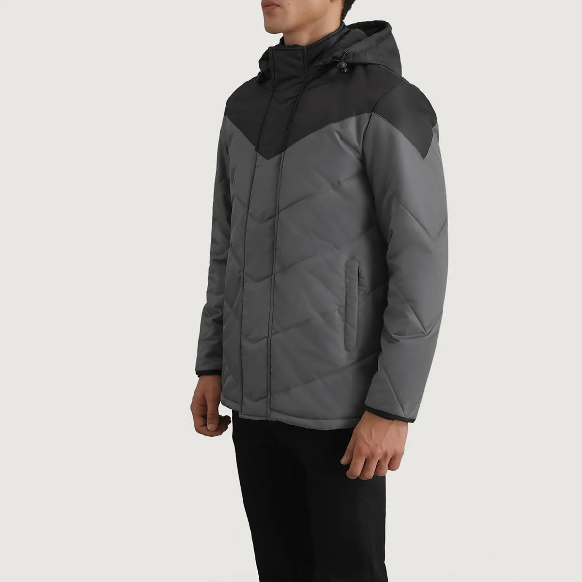 
Black & Grey Full-Grain Leather Hooded Jacket - 展现肩线贴合与利落下摆的背部视角