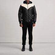 
Norman Tan Hooded Bomber Leather Puffer Jacket - 展现立体袖型与合身版型的侧身视角