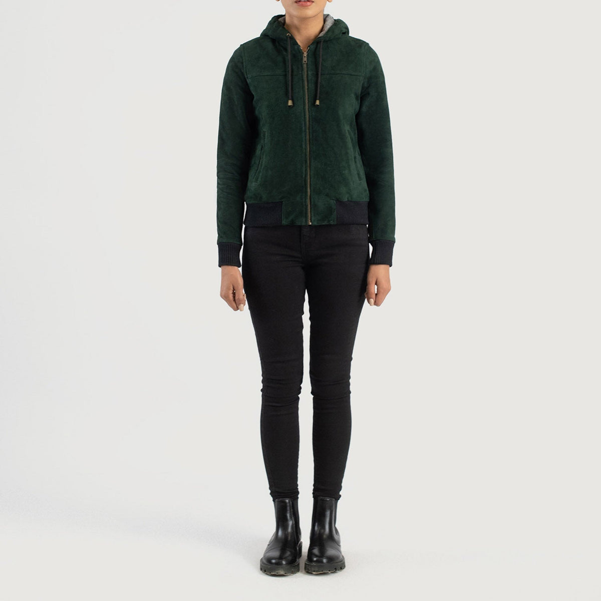 
Rebella Green Hooded Suede Bomber Jacket - 展现立体袖型与合身版型的侧身视角